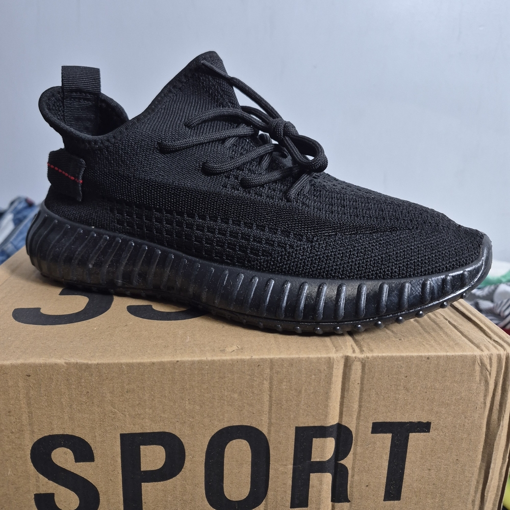 All-Black Knit Athletic Sneaker with Red Heel Tab